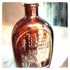 Vintage log cabin syrup bottle